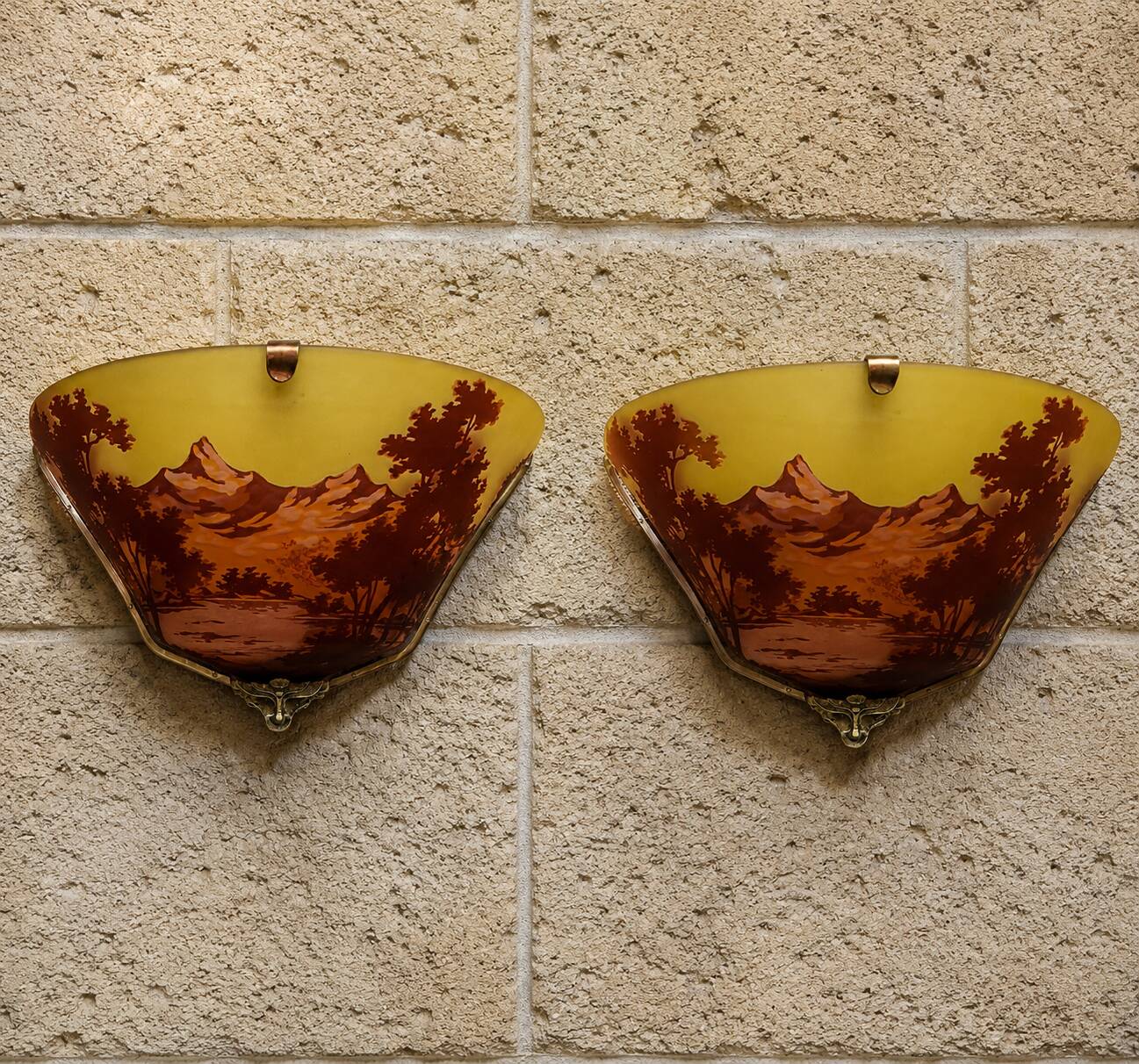 Pair of decorative wall sconces in Art Nouveau style.