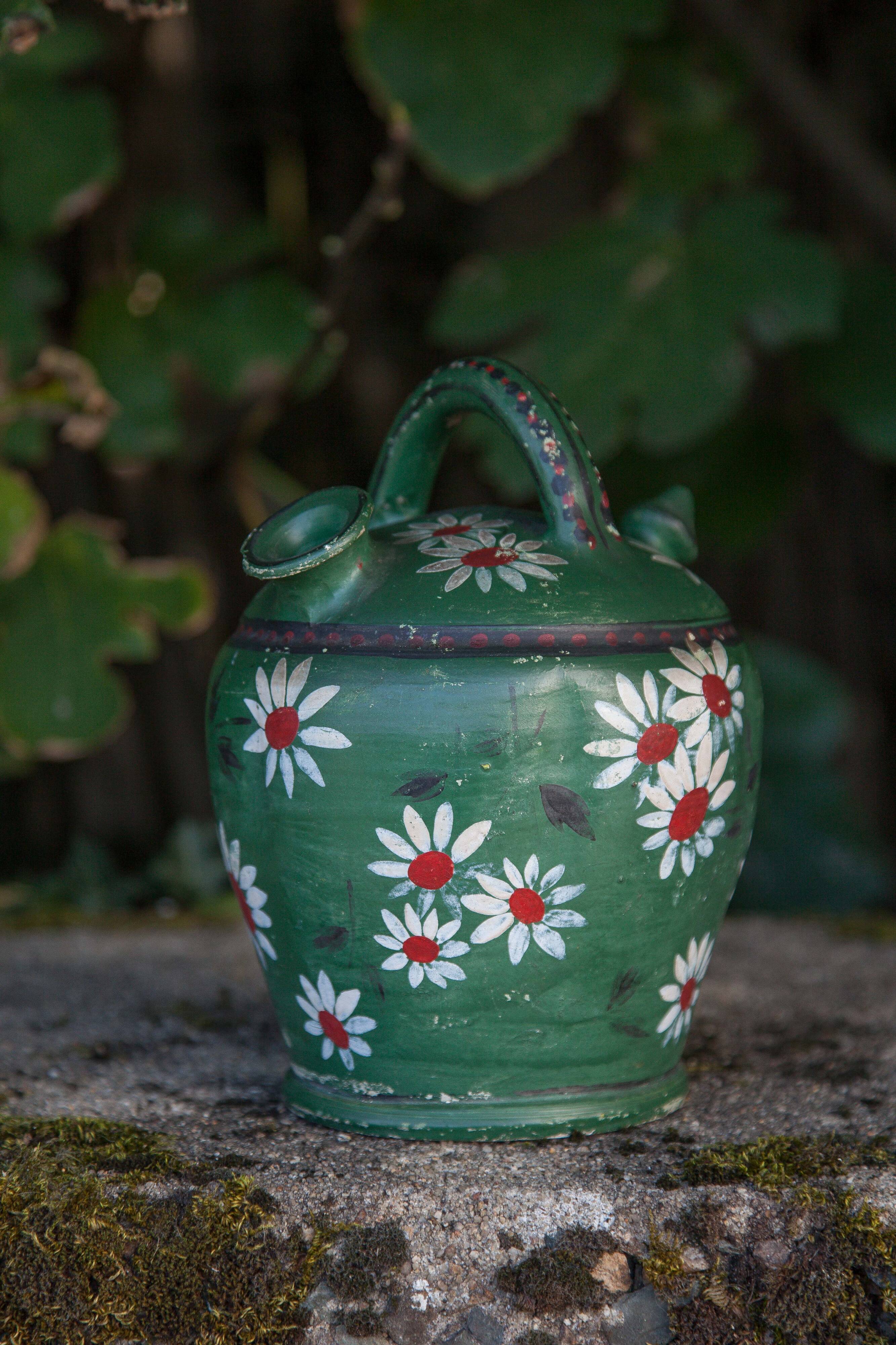 Vintage gargoulette, jug, green painted pitcher with daisy patterns