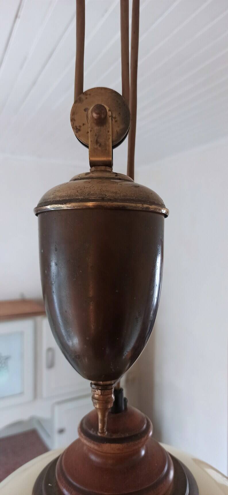 Old large pulley chandelier in brass and glass