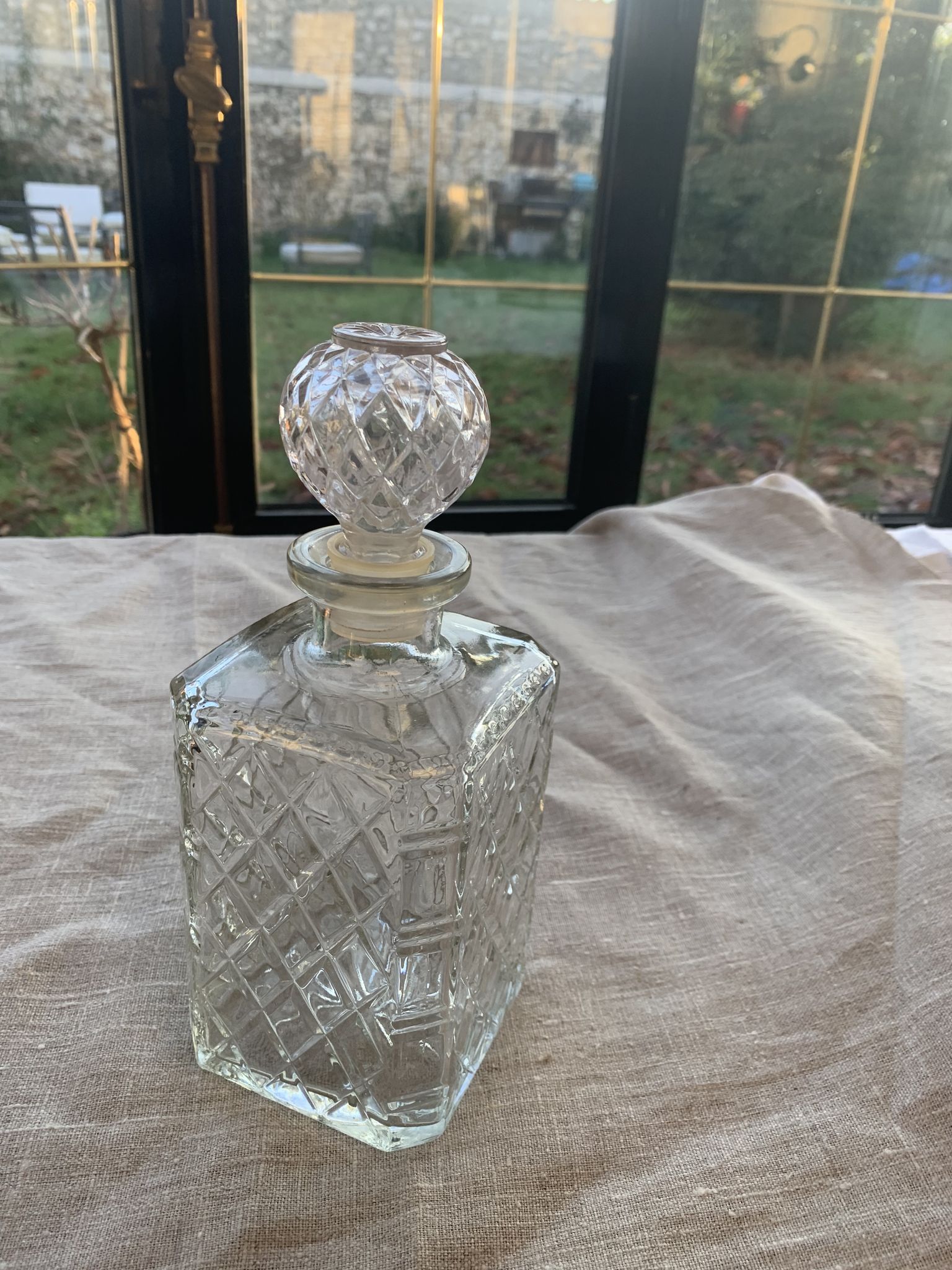 Vintage transparent molded glass whisky decanter