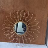Sun mirror in gilded metal
