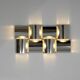 Contemporary wall light in stainless steel and metal.