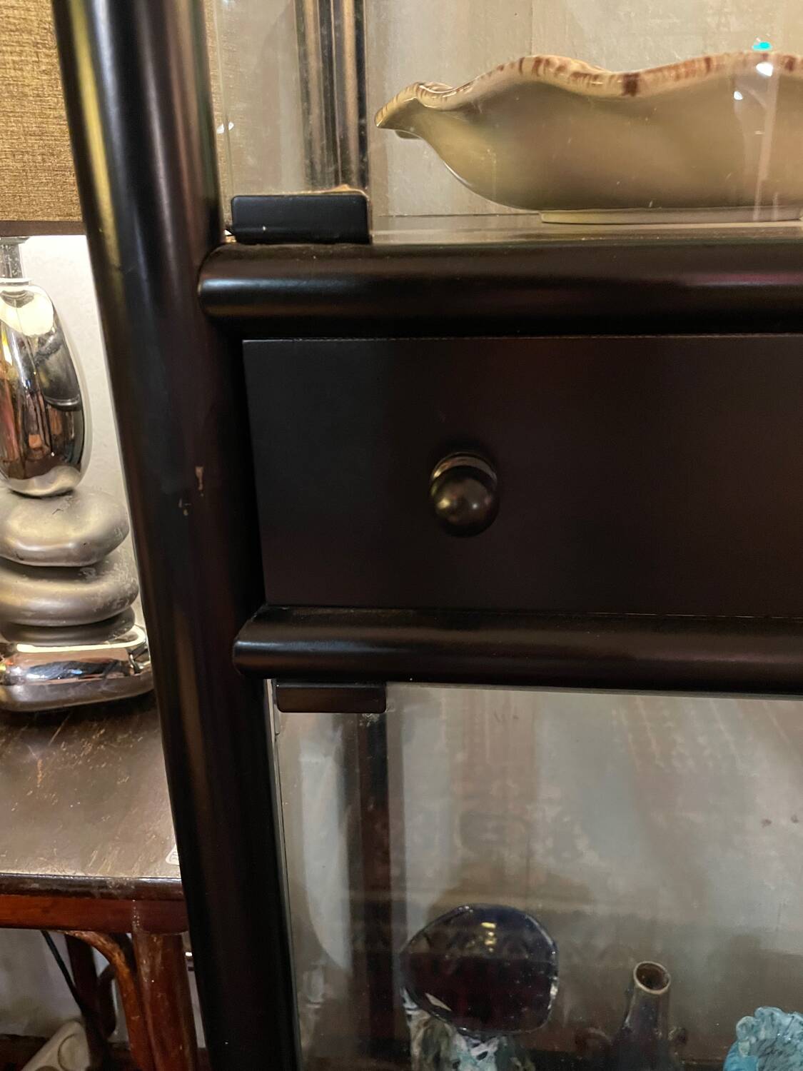 2 display cabinets signed by Baumann