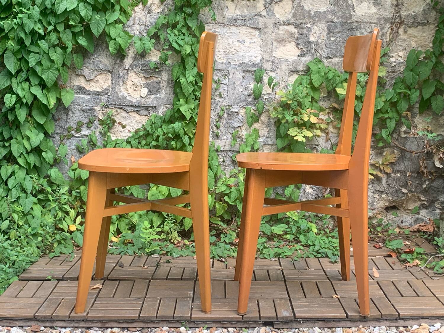 Pair of caramel bistro chairs 1950