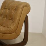 Fauteuil en cuir camel  année 60.