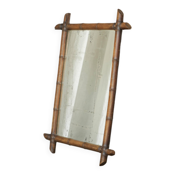 Grand miroir faux bambou en bois massif et miroir patiné, début XXe siècle