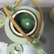 rare green celadon teapot ancient dragons or phoenix decoration with glaze and wicker handles signed /th