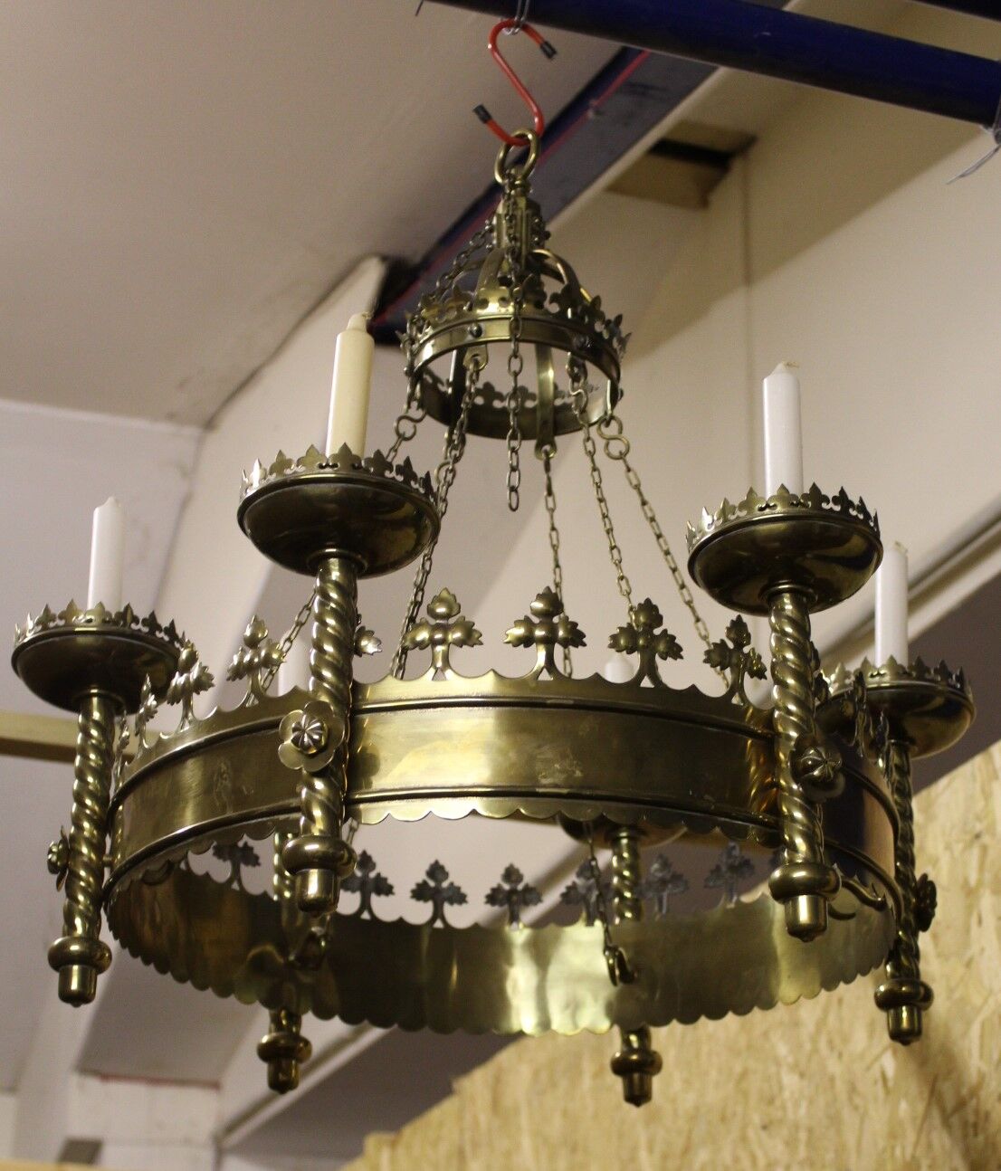 Brass chandelier in the style of Pugin with candles