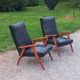 Pair of vintage beech armchairs feet compass covered with black moleskine from the 50s