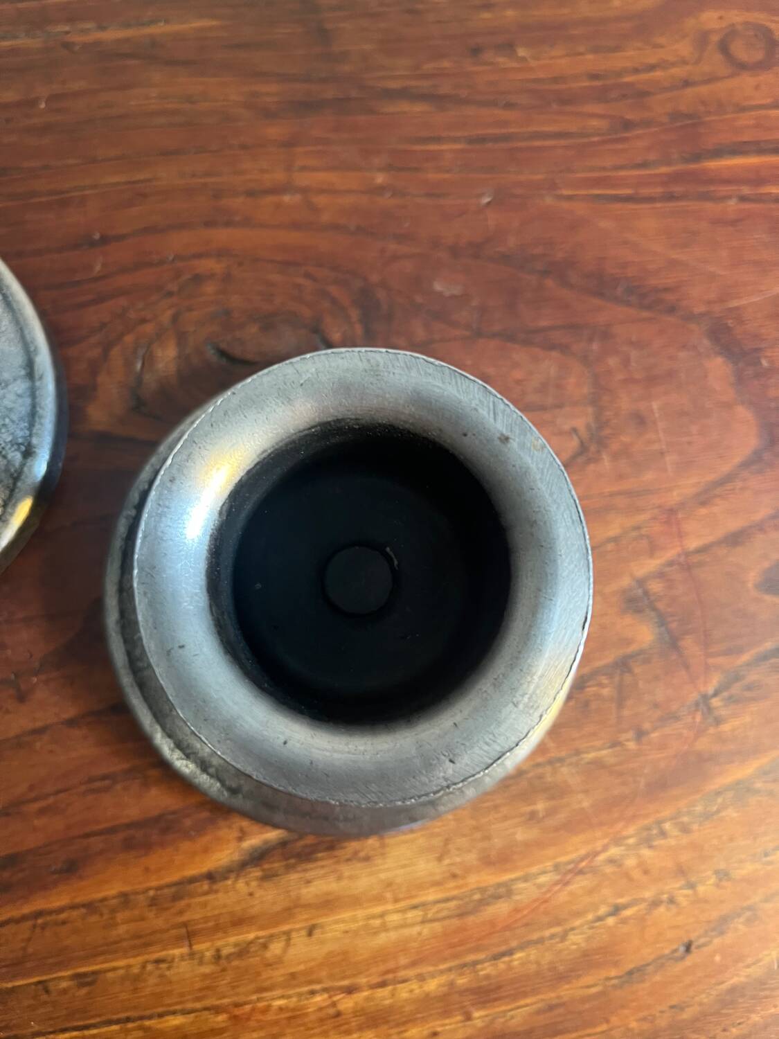 2 Charles Piguet wrought iron candlesticks