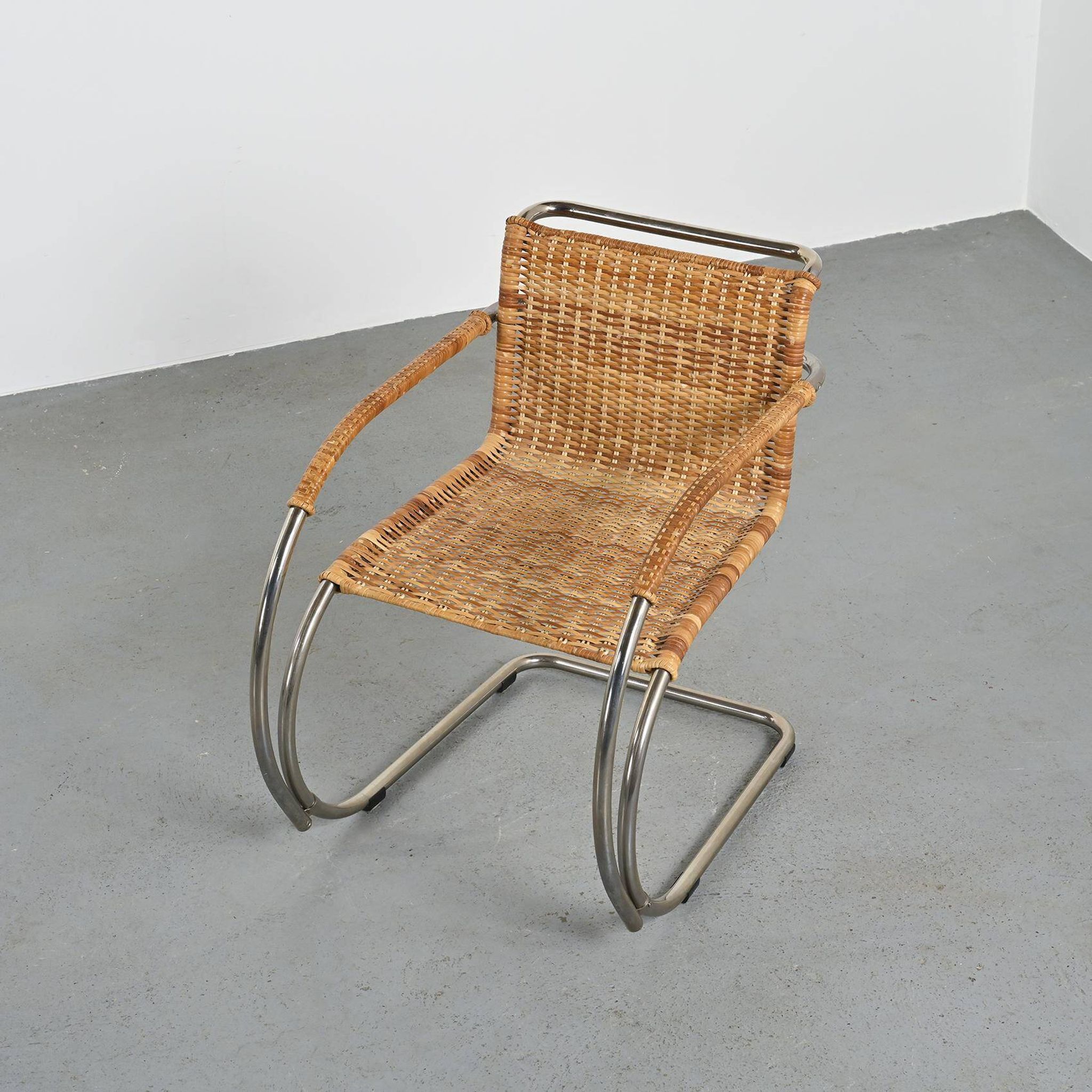 D42 tubular steel and cane armchair, Tecta, Germany, circa 1980
