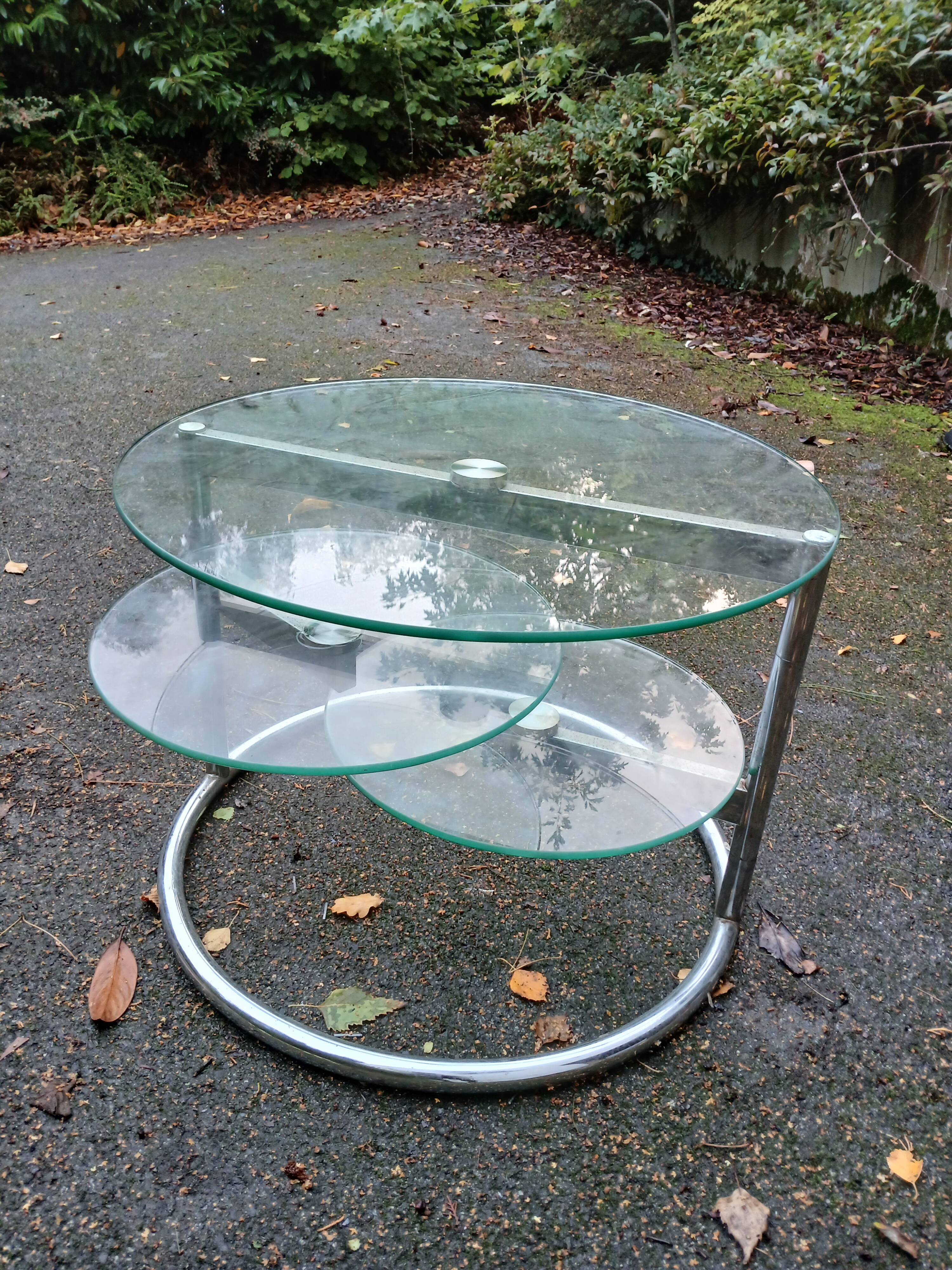 Old chrome metal coffee table with swivel tops from the 70s
