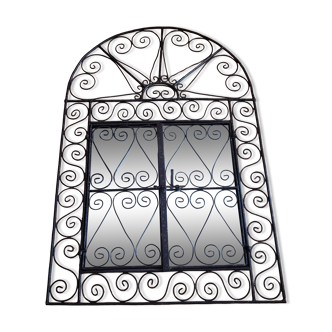 Oriental mirror with wrought iron door