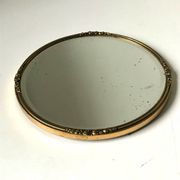 Miroir biseauté antique avec cadre en métal doré