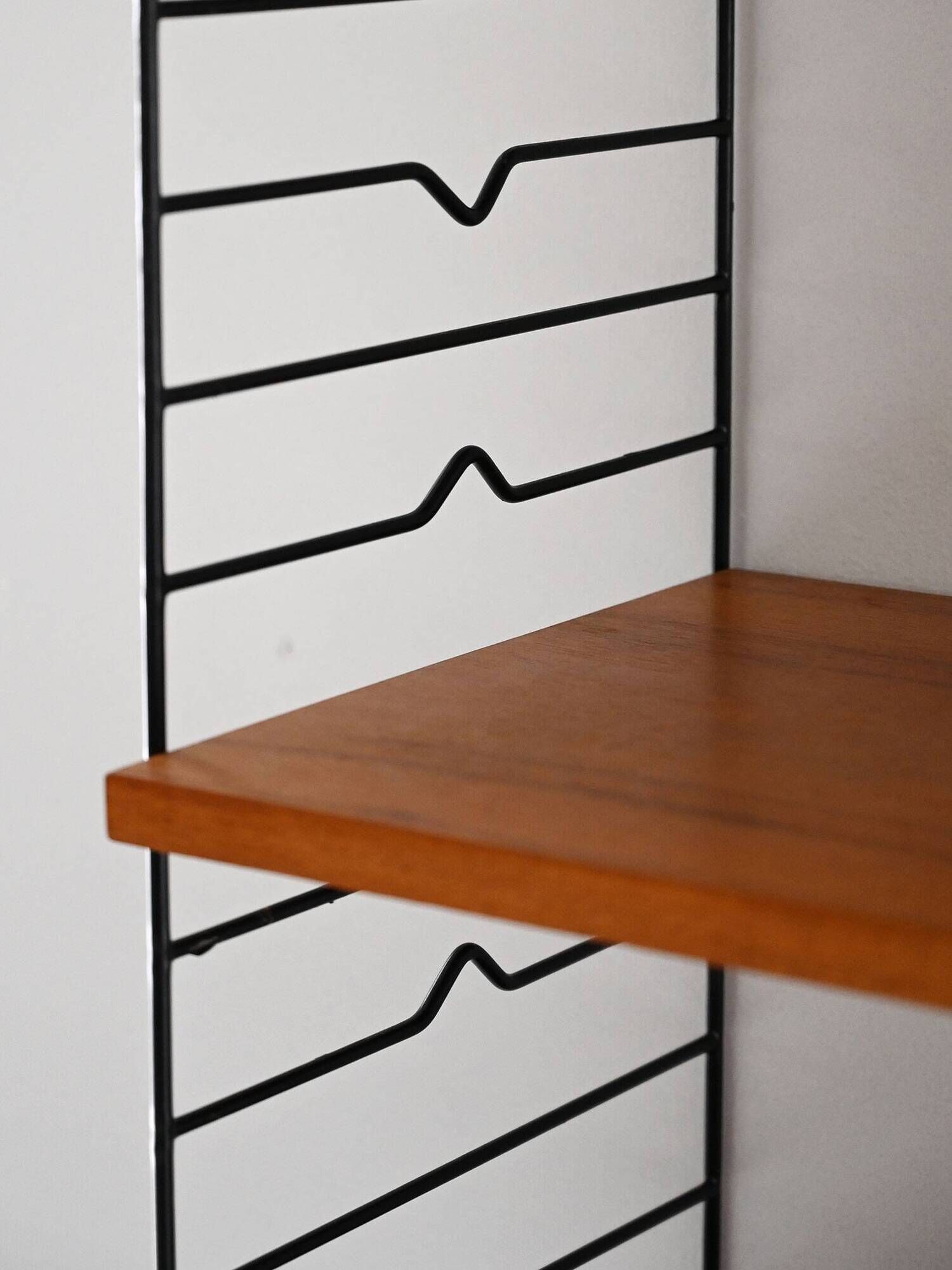 Scandinavian Hylla teak wall shelf with brass label