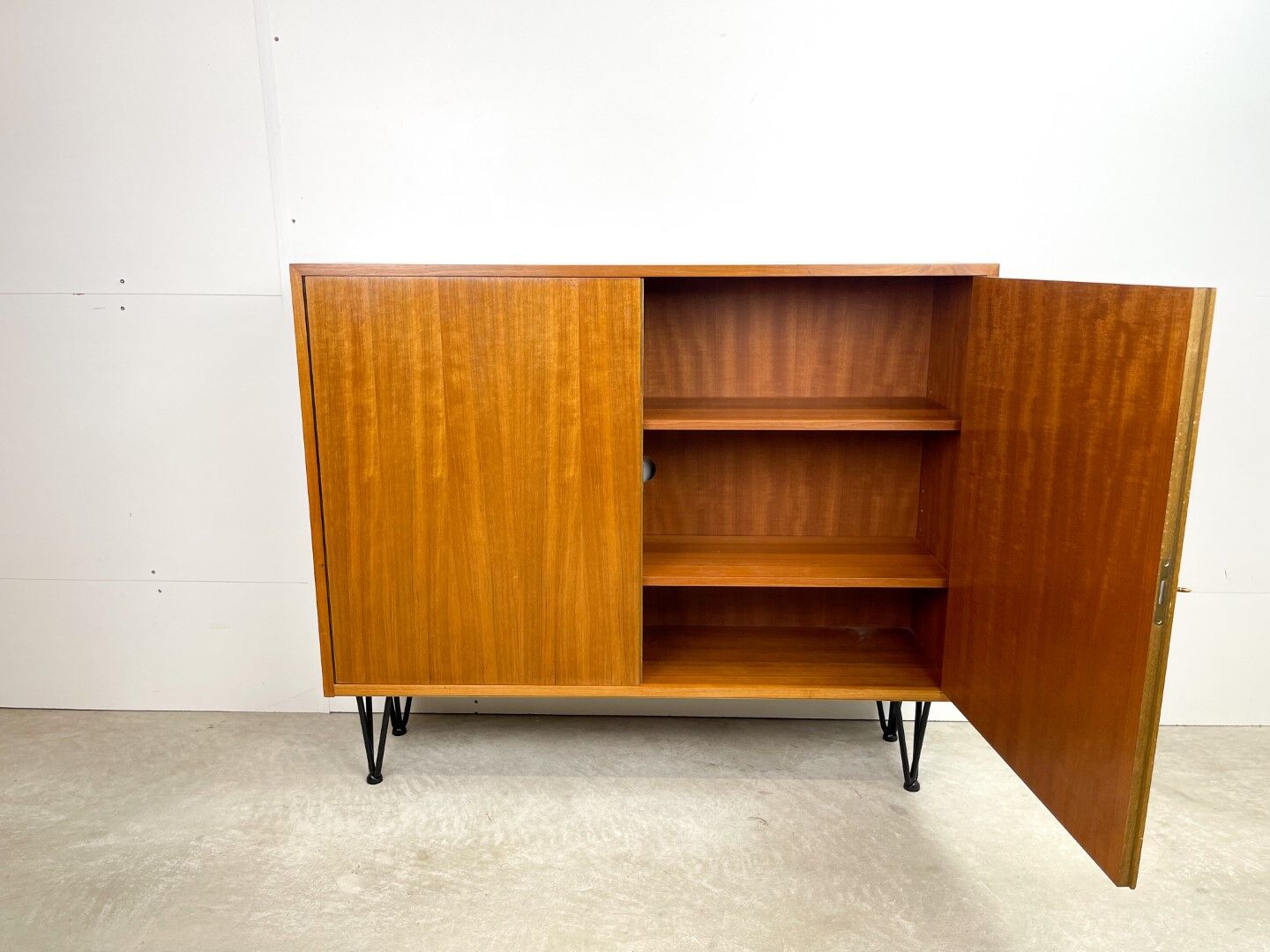High vintage cabinet with hairpin legs