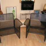 Pair of Italian armchairs in black lacquered metal with cushions from the house Talin