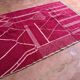Tapis Beni Ouarain en laine rose