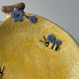 Lemon fruit barbotine plate with flowers and bees in ceramic