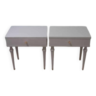 Pair of bedside tables with compass feet
