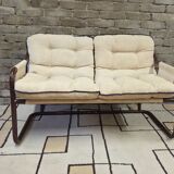 Tubular two-seater bench from the 1970s.