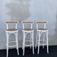 High stools in cane and curved wood 1970-1980