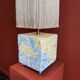 Base stuck blue beige marble-plaster, fringed lampshade Houles, 21st century.