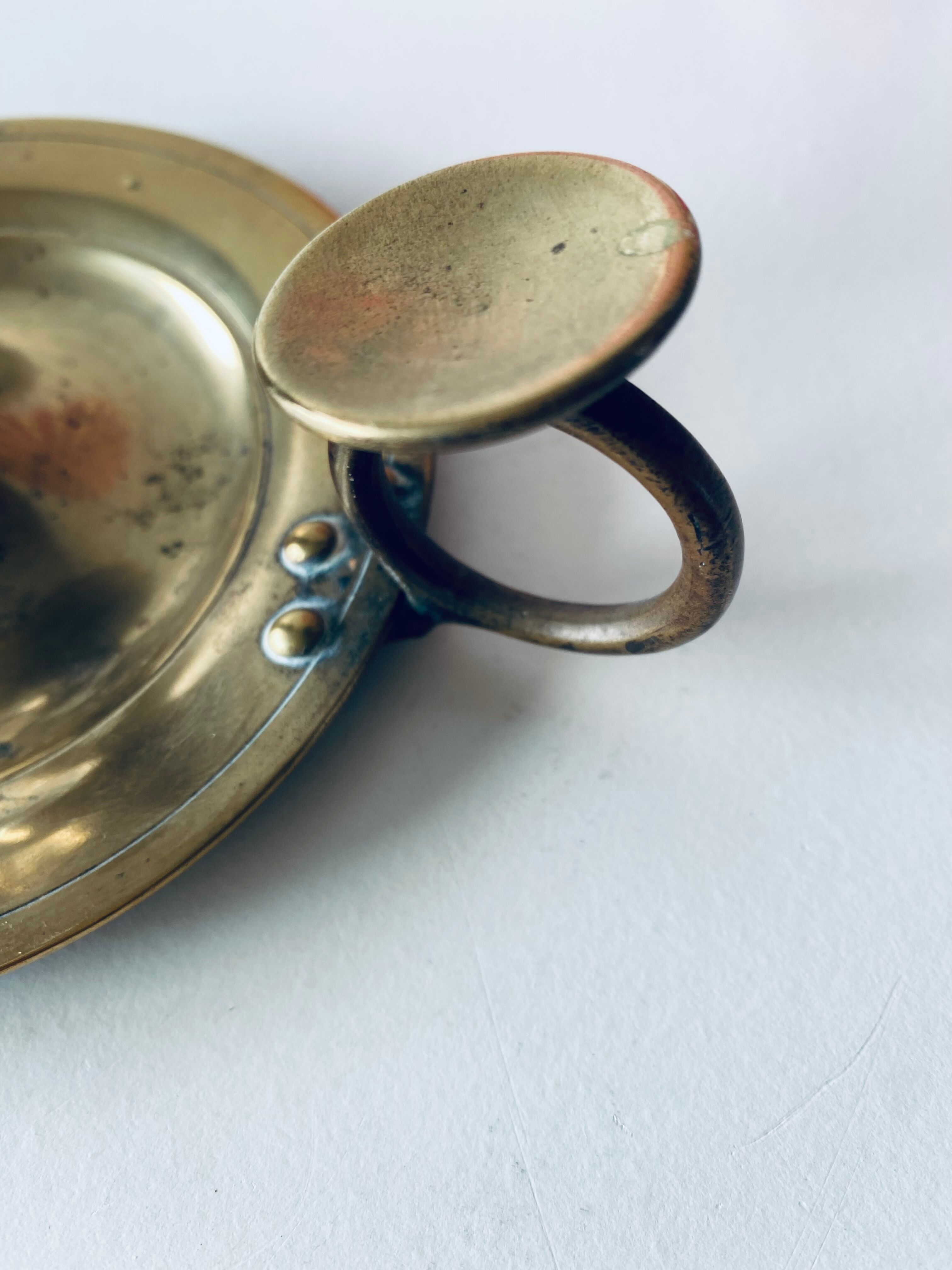 Old candle holder with handle
