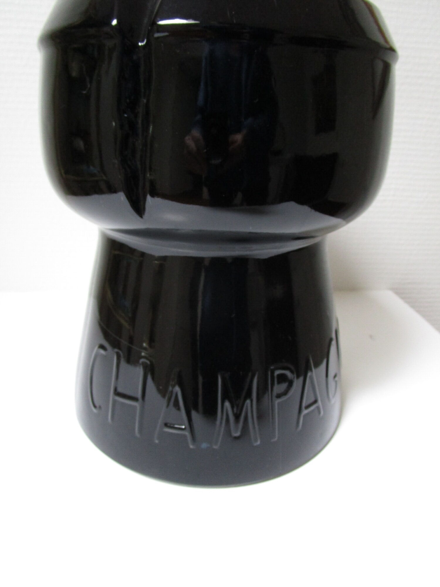Champagne bucket design black glass in the shape of a 70s cork