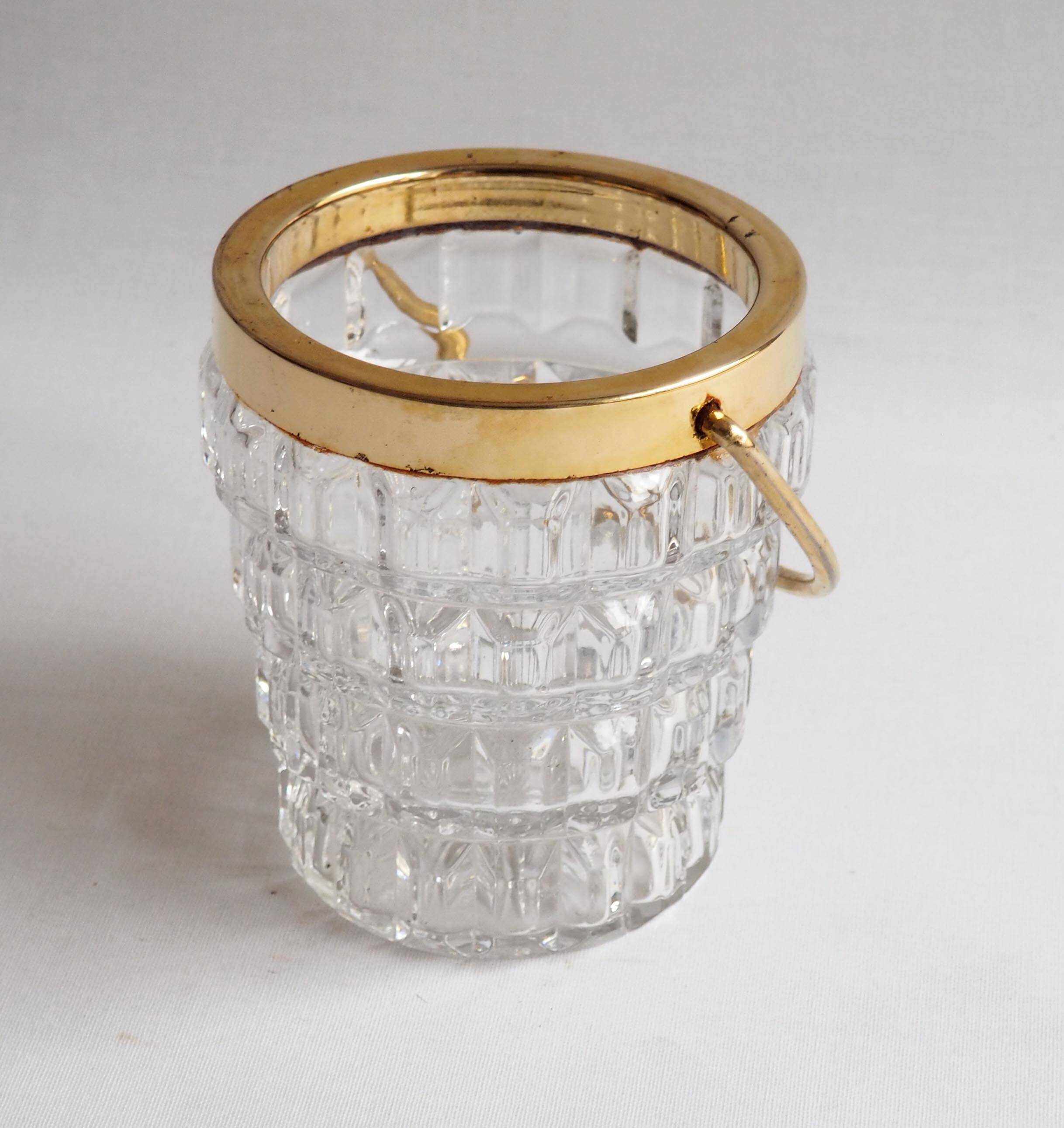 Crystal ice bucket and golden ladle