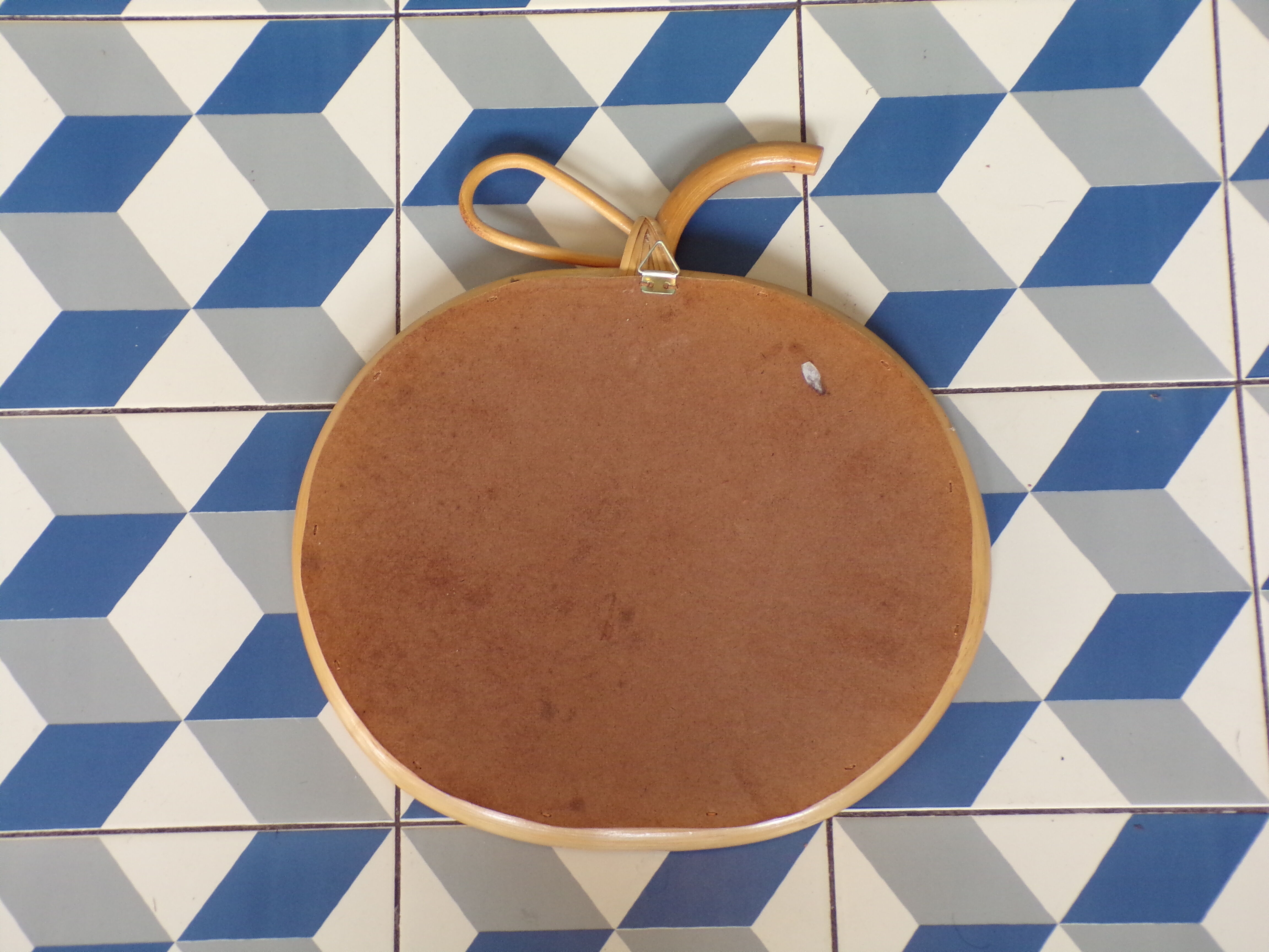Vintage rattan apple mirror