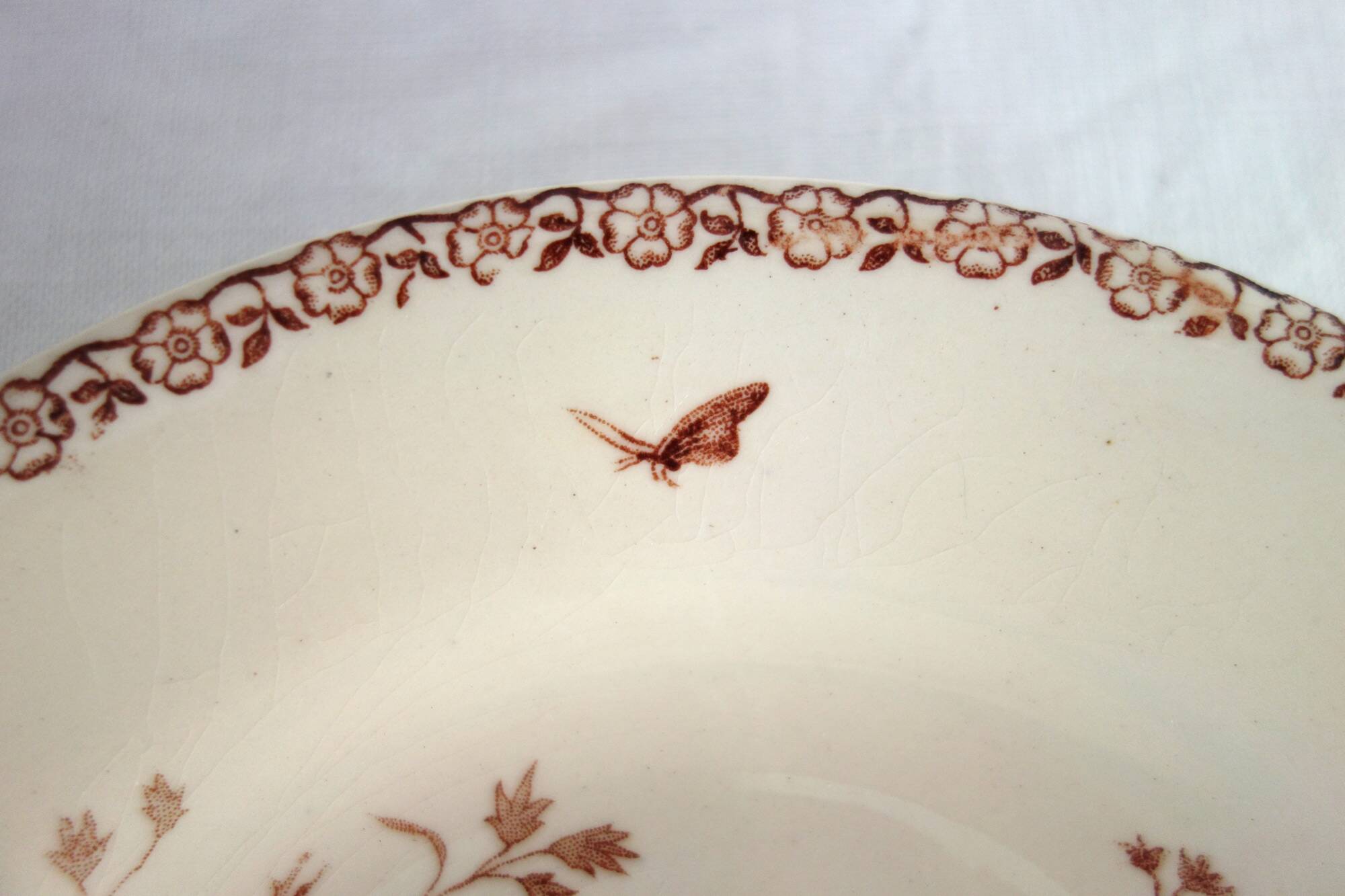 11 deep plates Terre De Fer Gien model Mai circa 1900