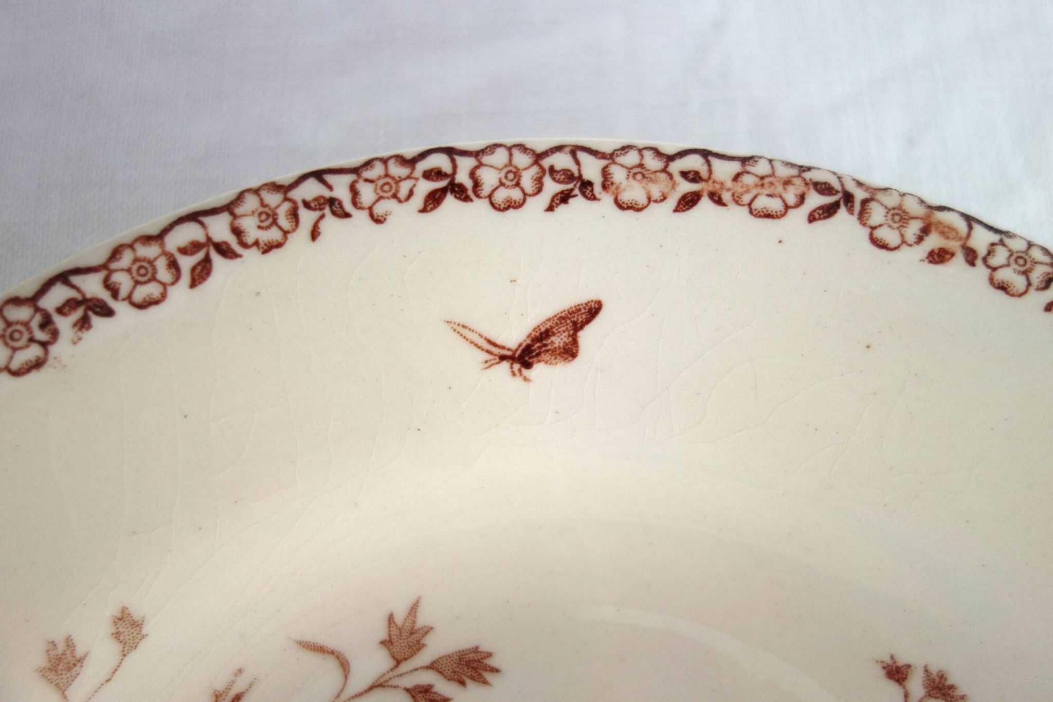 11 deep plates Terre De Fer Gien model Mai circa 1900