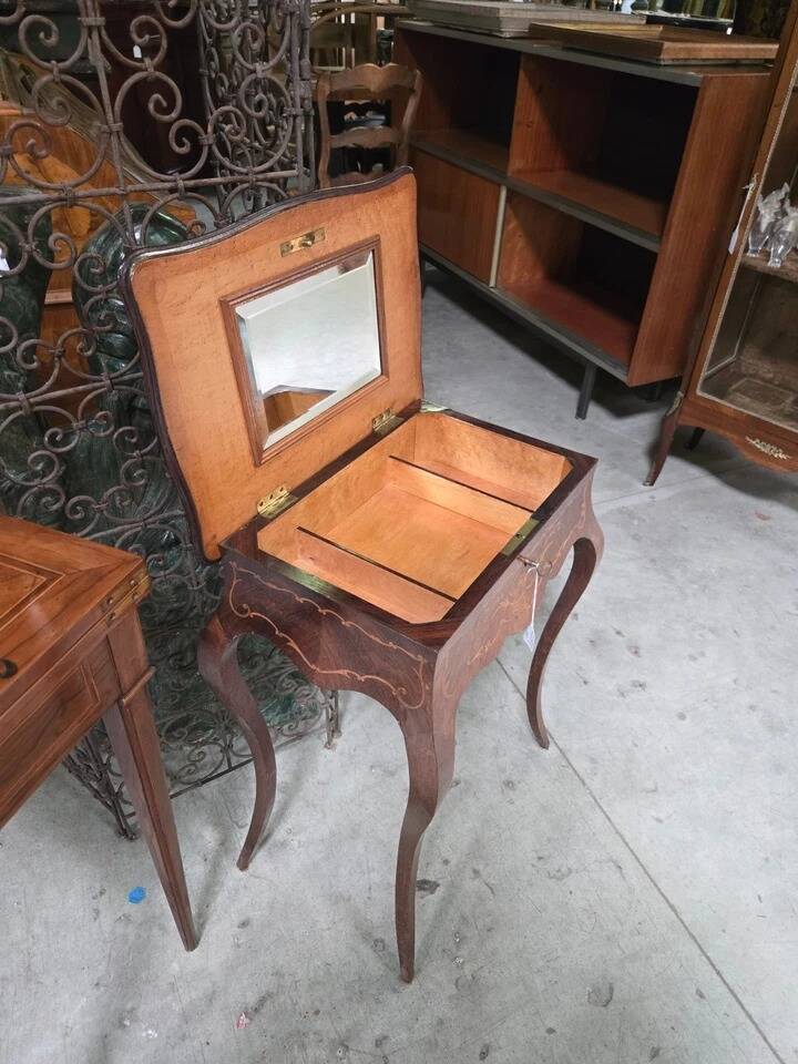 work table from the Napoleonic III era with marquetry of scrolls and patterns