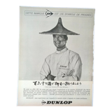 A Dunlop tire paper advertisement from a period magazine