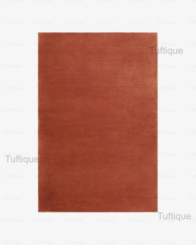 Hand tufted wool rug 250/150cm