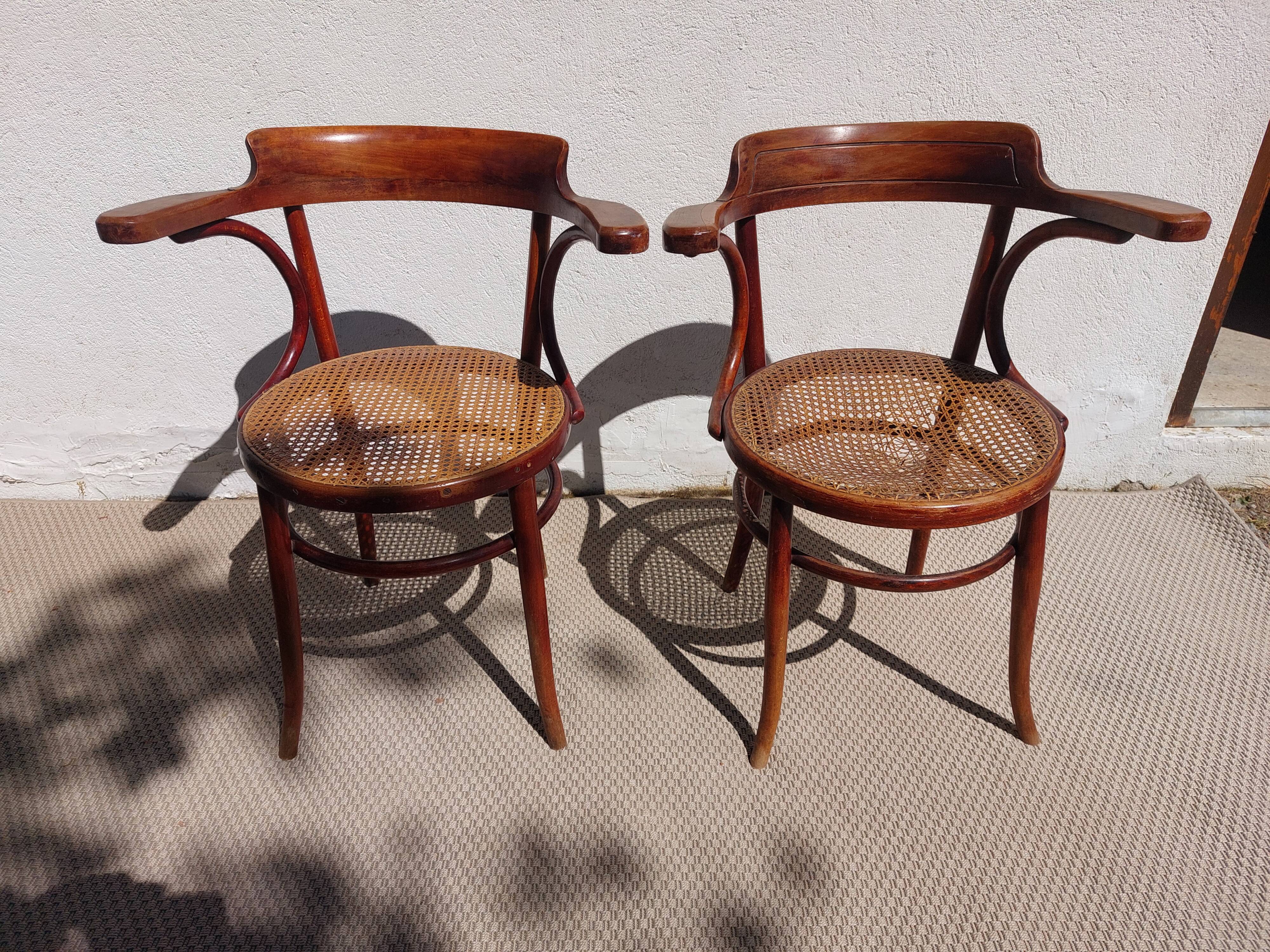 Paire de fauteuils cannés Fischel