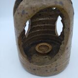 Stoneware candle holder.