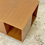 Rotating coffee table magazine holder