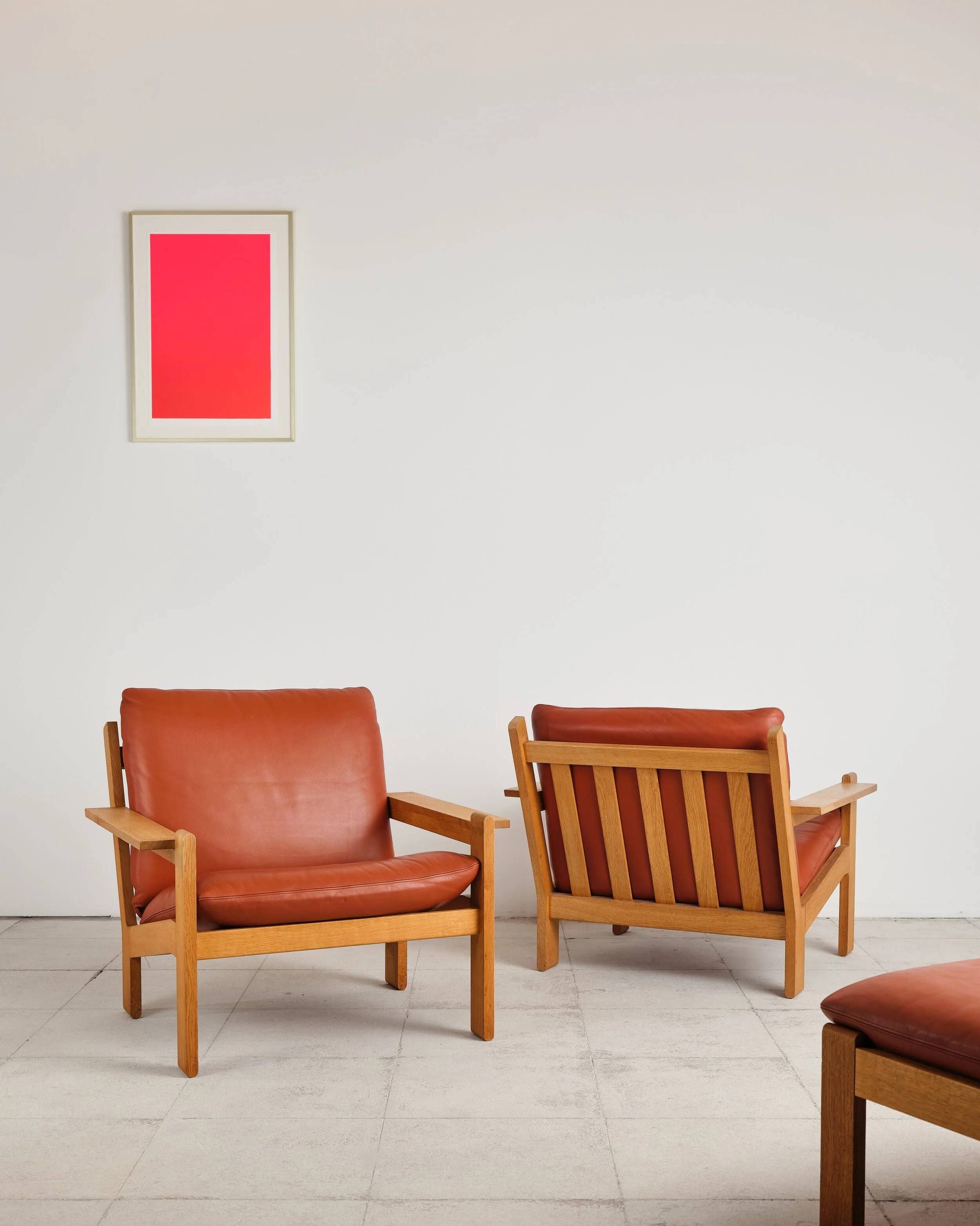 Pair of armchairs and ottoman by Tage Poulsen, Denmark, 1970s