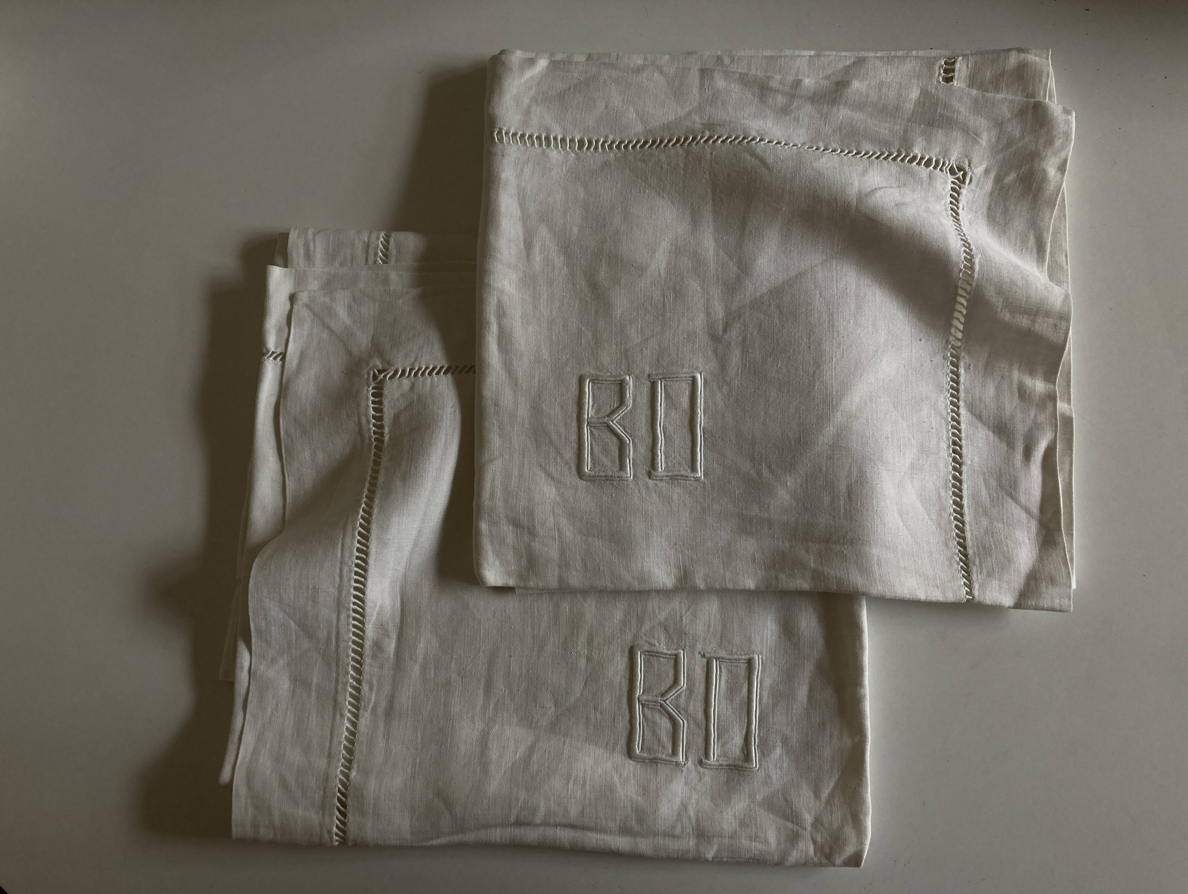 Pair of modernist linen pillowcases embroidered with comic strips