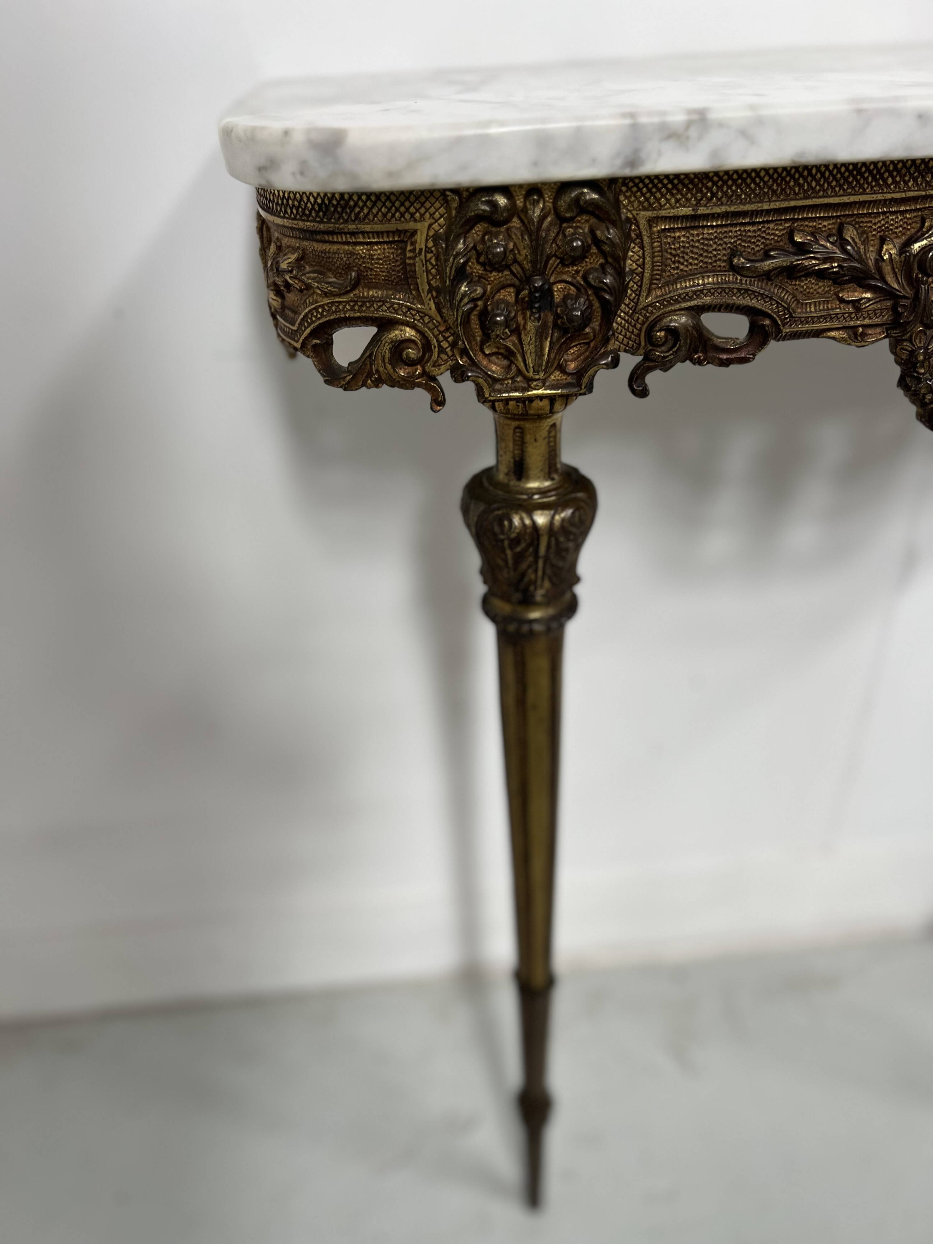 Louis XVI style console in gilded bronze, 20th century
