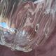 Twisted moulded glass bistro champagne bucket with a silver metal collar.