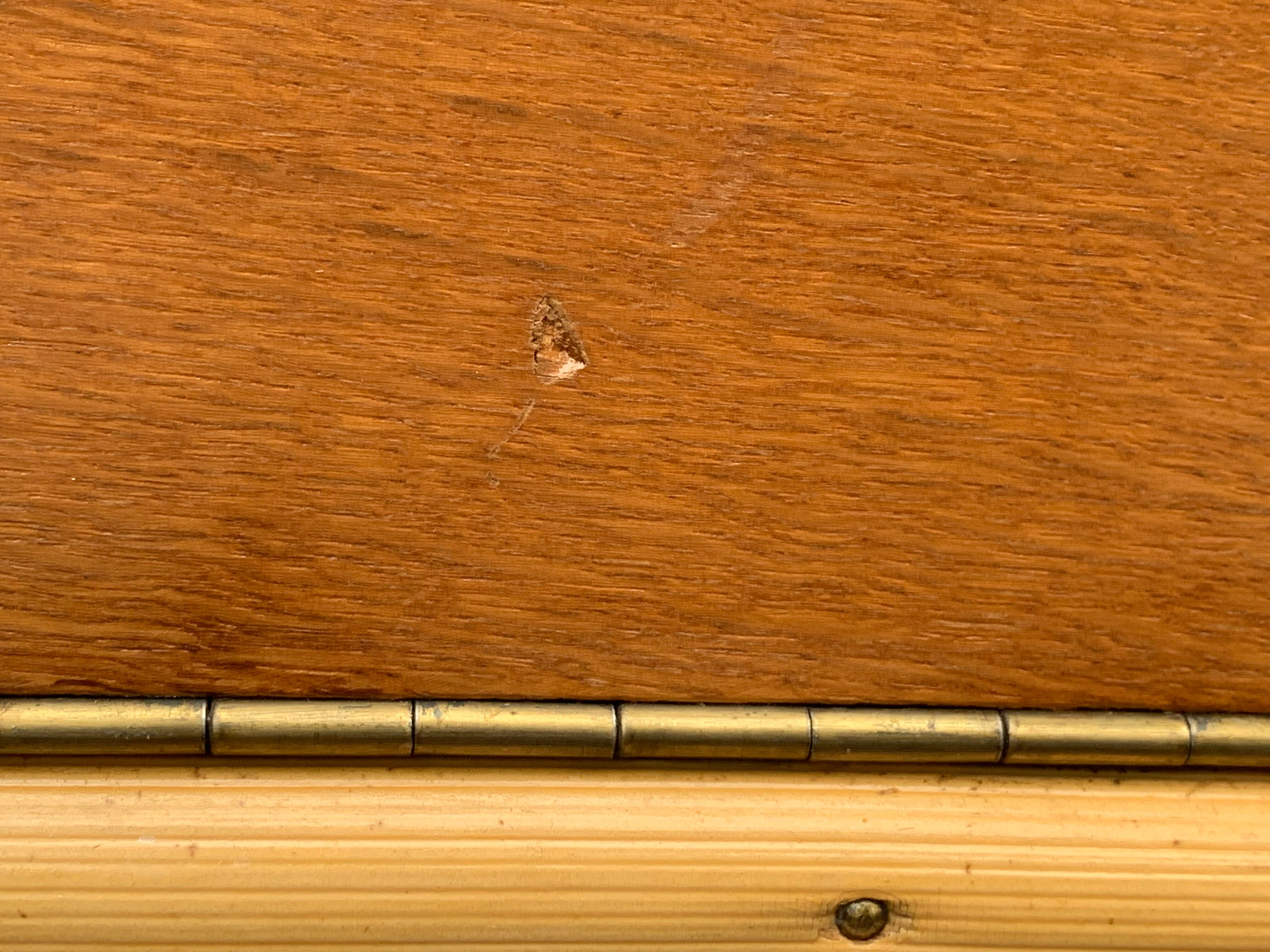 Rattan wardrobe with tapered legs from the 1960s.