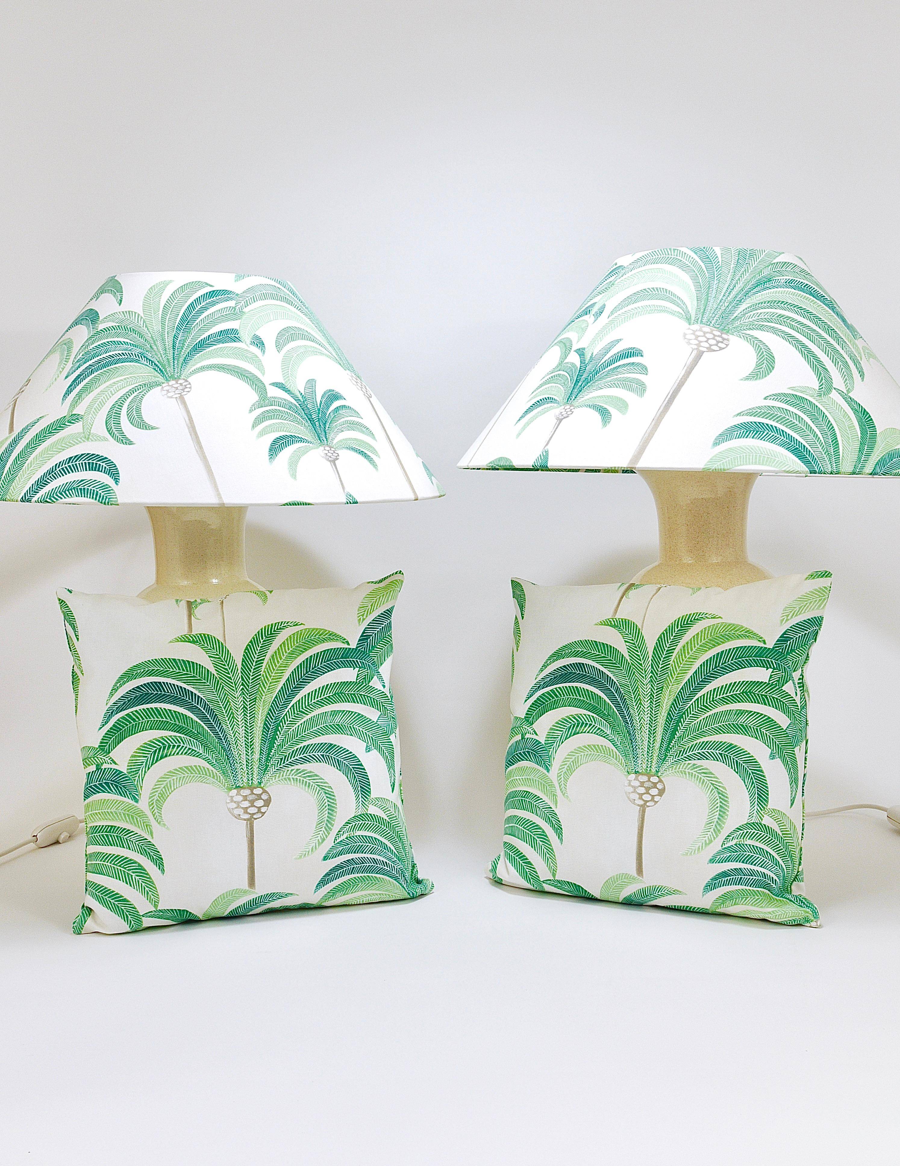 Pair of Tommaso Barbi Riviera palm tree table lamps from the 1970s with matching cushions.