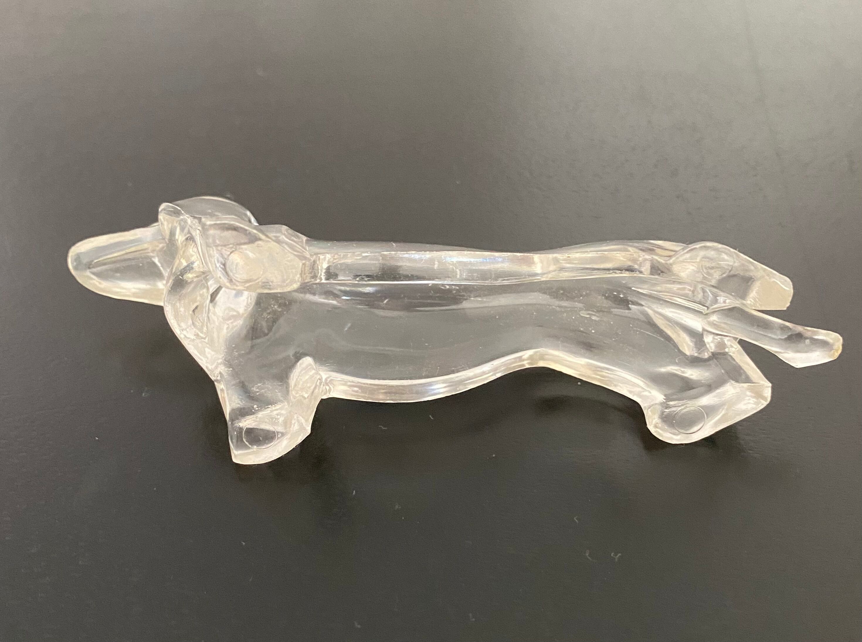 8 plastic knife holders, 70s, dachshund shape