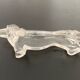 8 porte-couteaux en plastique, années 70, forme teckel