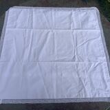 Large pillowcase, white cotton, lined with lace and monogrammed, closed with mother-of-pearl buttons