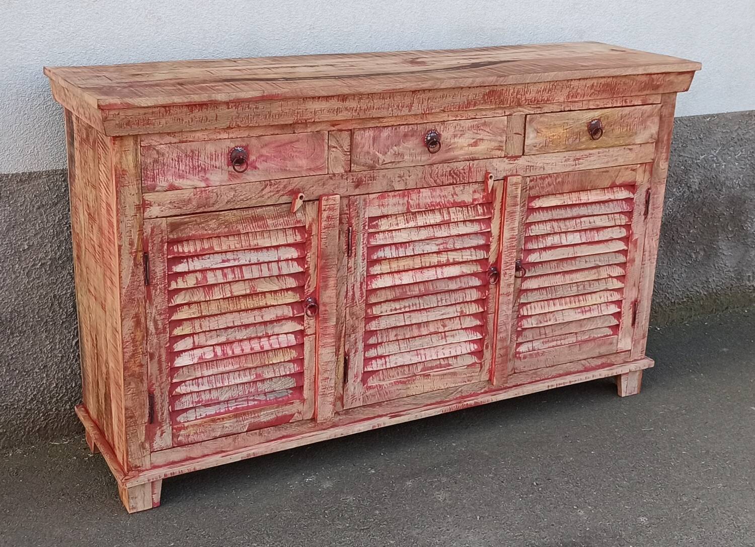 Wooden sideboard with red highlights