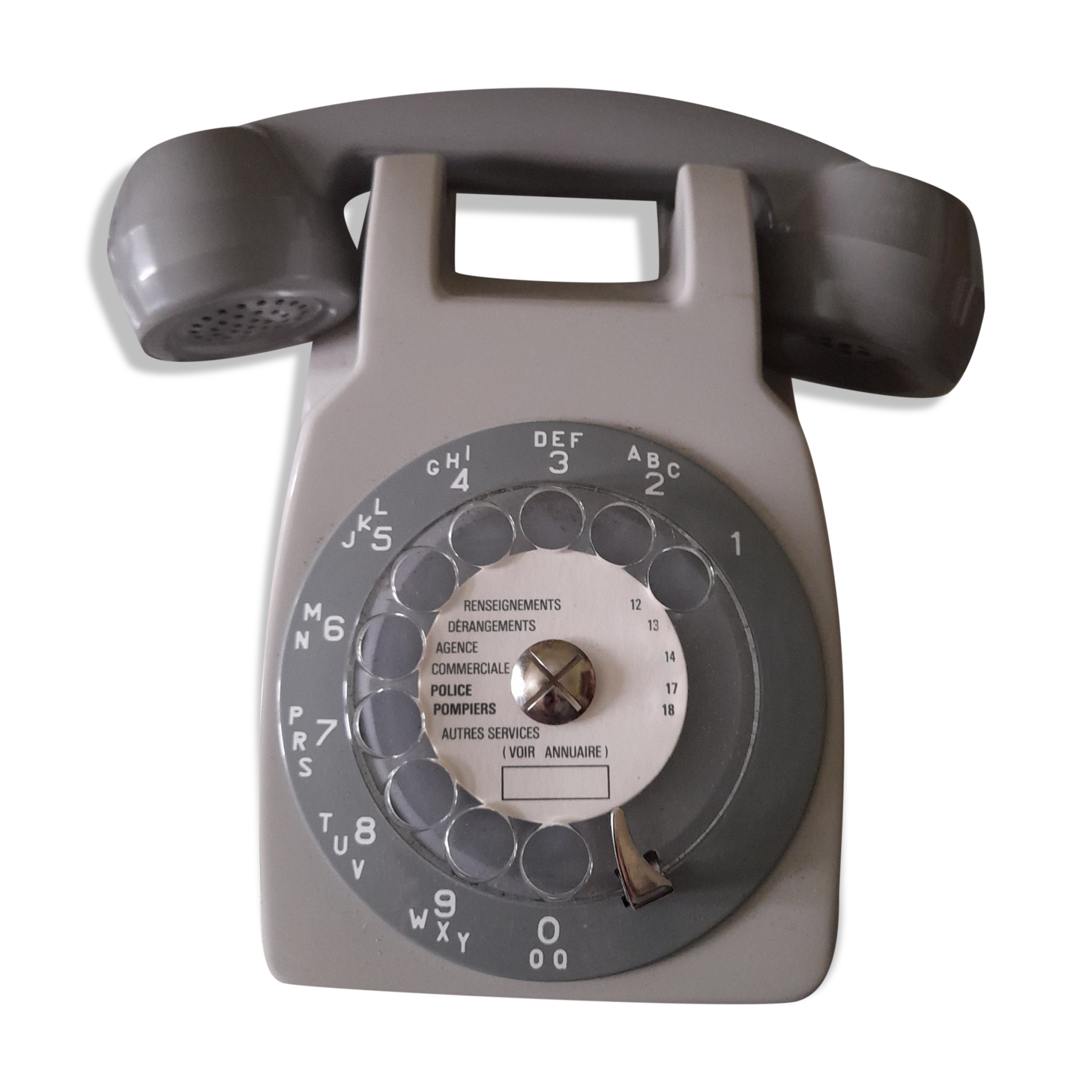 Wall telephone with dial with amplifier
